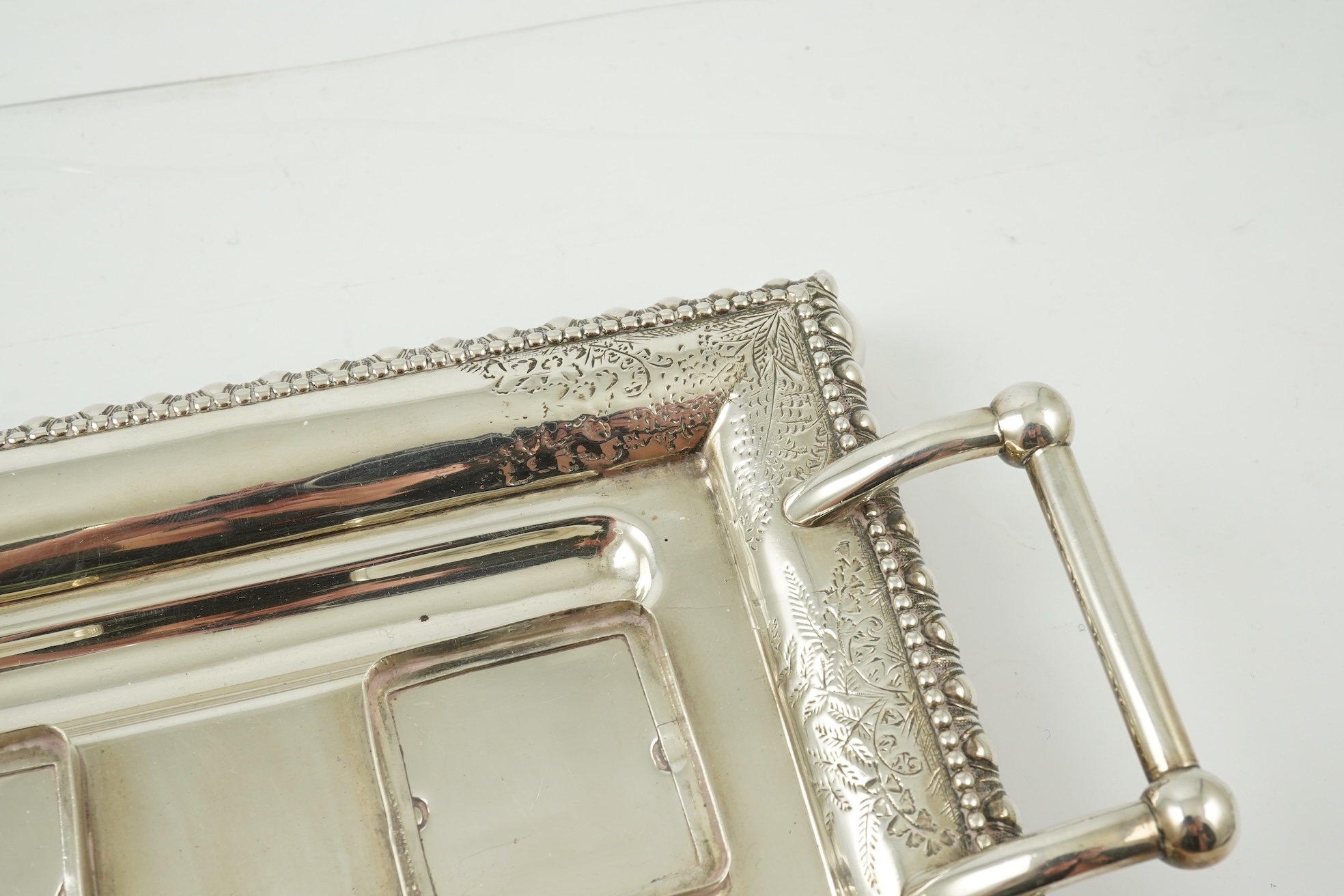 A late Victorian silver two handled rectangular inkstand by George Unite